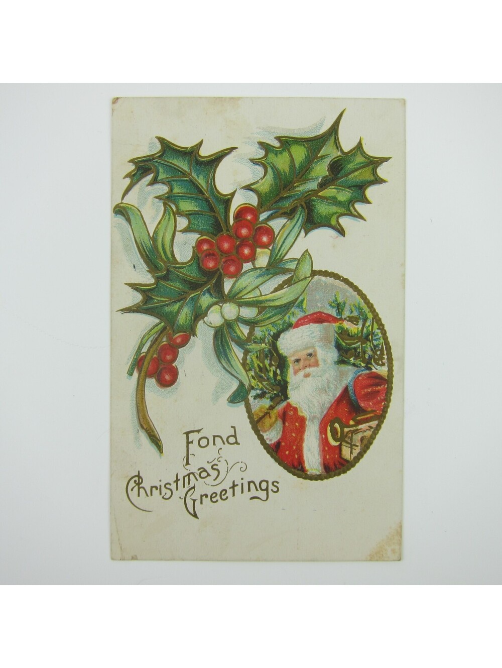 Christmas Postcard Santa Bag Toys Tree Snow Holly Berries Embossed Antique 1908